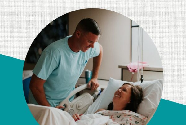 Text: Birth Boot Camp Reviews: What Parents Really Think About Our Online Childbirth Classes. Image: Couple smiling at each other in a hospital room. Newborn baby in moms arms.